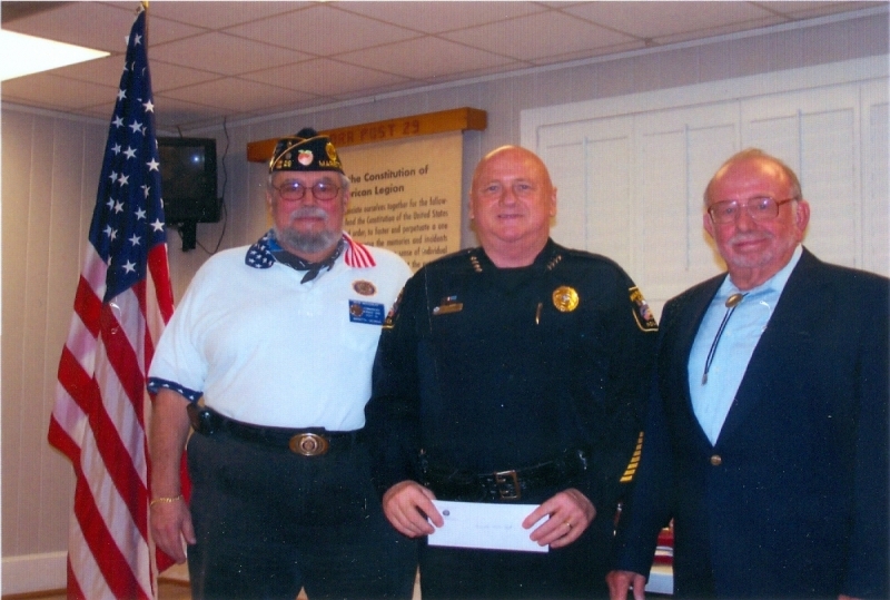 Post Presents a Check to the Marietta Police Department The American